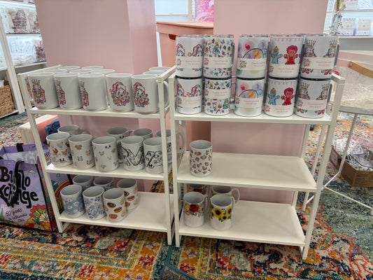 Small white metal display shelves